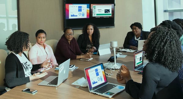 Professionals screen sharing in an office