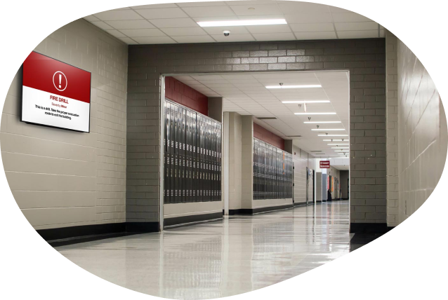 school hallway with lockers and tv on wall showing emergency alert