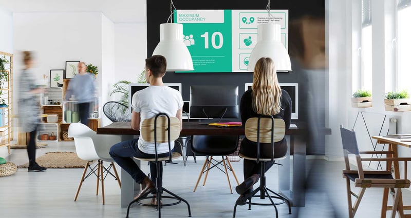 Digital signage on a TV in a coworking office space