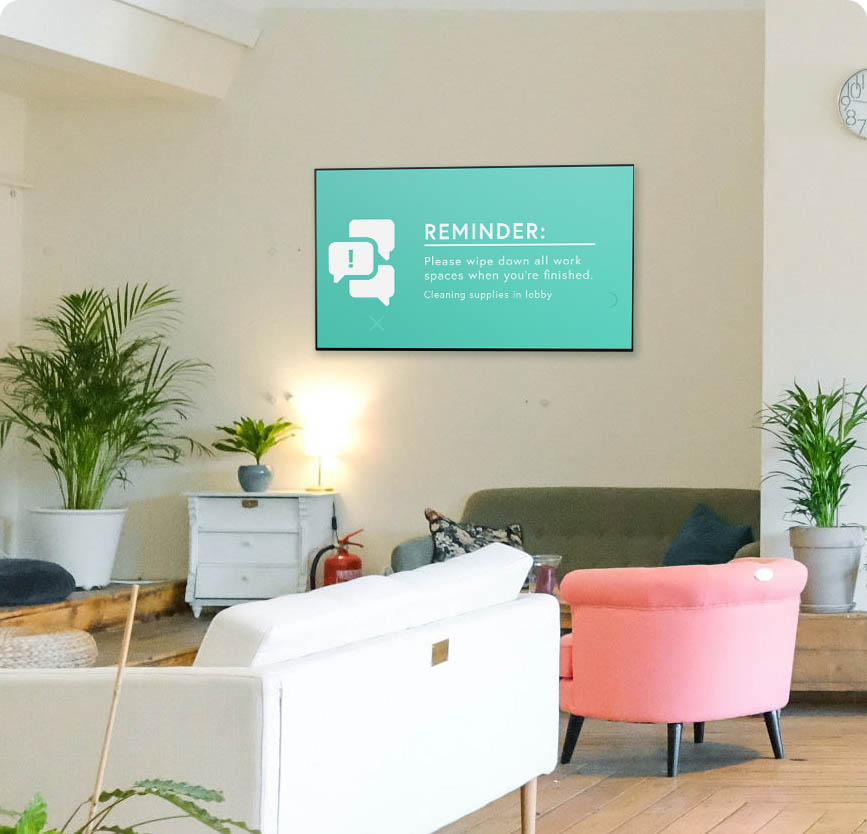 Digital signage in a casual office space with couches 